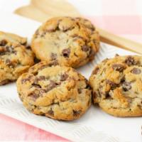 Giant Chocolate Chip Cookies · Cakey Chocolate Chip Cookies, best when dipped in a cold glass of milk! 

If you love cakey ...