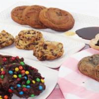 Mix Of Giant Cookies · In each box, there is an equal amount of chocolate chip cookies, double chocolate M&M cookie...