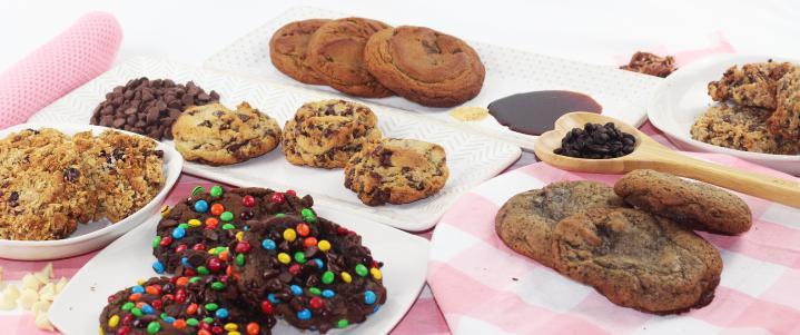 Mix Of Giant Cookies · In each box, there is an equal amount of chocolate chip cookies, double chocolate M&M cookies, ginger molasses cookies, white chocolate cranberry oatmeal cookies, cowgirl cookies, and espresso chocolate cookies.