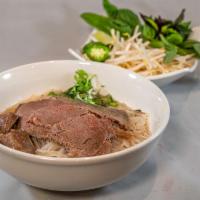 Beef Pho · Rice noodle soup, filet Mignon beef, meat balls and brisket.