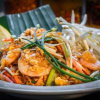 Pad Thai · Stir fried rice noodle with sweet tamarind sauce, bean sprouts, green onions, carrots. Serve...