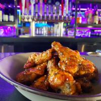 Crispy Chicken Wings · Choice of homemade sauces: Buffalo, BBQ, or Thai Street Style.
8 wings served with cucumbers...
