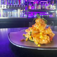 Spicy Firecracker Shrimp · Lightly battered crispy shrimp tossed in our special firecracker chili sauce, served on a re...