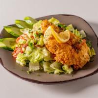 Aunt Bea’s Fried Chicken Salad · Crispy buttermilk fried chicken breast on a bed of iceberg romaine lettuce mix with red cher...