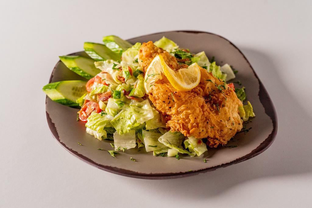 Aunt Bea’s Fried Chicken Salad · Crispy buttermilk fried chicken breast on a bed of iceberg romaine lettuce mix with red cherry tomatoes, smoky bacon, cucumber & homemade lemon farmhouse dressing