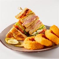 Clubhouse Triple · Thick slices of smoked ham, paired with thinly sliced roasted turkey breast & smoky bacon to...