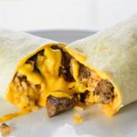 Steak, Rice and Mexican Queso · Marinated skirt steak burrito with Chihuahua cheese, Mexican rice, and  Cosmic-made red salsa.