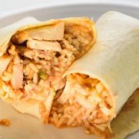 Chicken Burrito · Marinated, smoked chicken that is grilled to tender perfection and rolled in with Mexican ri...