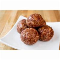 Strawberry Almond Bites · Whole grain oats, strawberry preserves, almond slices, almond butter, agave, coconut, and va...
