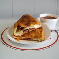 Meat Calzone · Pepperoni, ground beef and sausage.