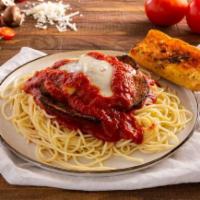 Eggplant Parmigiana with Spaghettini · Breaded sliced eggplant topped with Marinara sauce and mozzarella cheese on a bed of spaghet...
