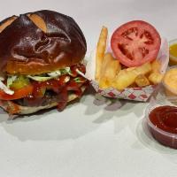 Hamburger pretzel bun · come with sliced tomato ,white cabbage,pickle and ketchup