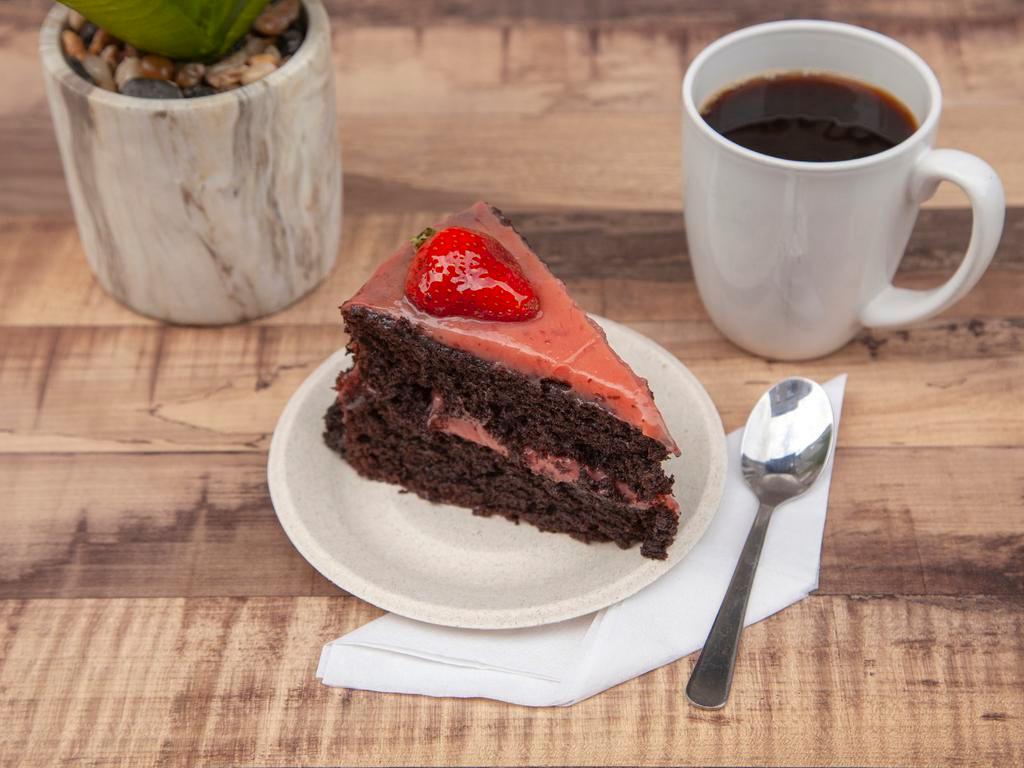 Mamita Linda Cake · Chocolate cake with strawberry filling.