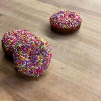Vanilla Sprinkle Cake Donut · Vanilla Cake Donut Iced Vanilla Icing and topped with Multi Colored Sprinkles