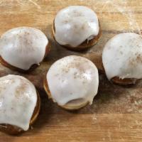 Apple Paczki · Sweet yeast doughnut filled with Apple filling, diced apples, topped with vanilla icing and ...