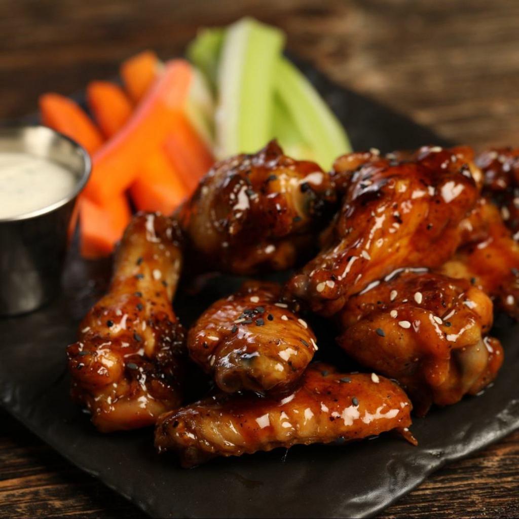Teriyaki · 8 teriyaki smoked and grilled wings (mild heat), served with carrots & celery and a choice of blue cheese, classic ranch, or Sriracha ranch for dipping