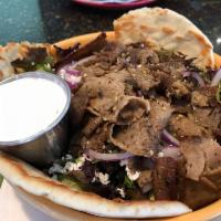 Greek Salad with Gyro Meat · Greek salad topped with Gyro's meat, Greek dressing, tzatziki sauce on the side.