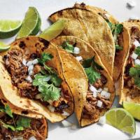 Taco de Carnitas  · Mexican shredded pork. 1 taco with chopped cilantro & onion & your choice of our delicious g...