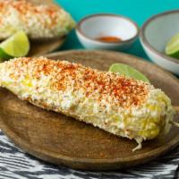 Mexican Sweet Corn · Comes with mayo, Mexican cheese, chili powder and a lime wedge.