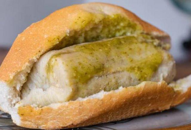 Torta De Tamal · GUAJOLOTA, also known as a TORTA DE TAMAL, is a form of street food commonly found in Mexico City and within the State of Mexico. It is essentially a sandwich composed of a (2) tamales placed inside a telera( Mexican Bun ).