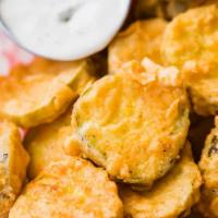 Fried Pickles · Basket of battered and fried pickles served with jalapeno ranch.