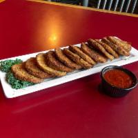 Fried Eggplant Chips · Hand-breaded eggplant chips fried golden brown.