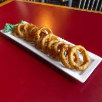 House-Made Onion Rings · Hand-breaded onion rings fried golden brown.