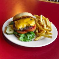 6 oz. Hand Pattied Fresh Ground Beef Burger · On a fresh-baked bun and served with chips. Sub fries, soup, or salad for additional charges...