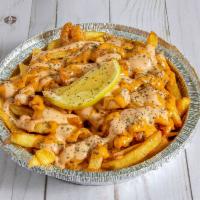 Loaded Seafood Fries · Includes crabmeat, shrimp, and special sauce.