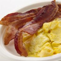 Bacon and Eggs · 3 eggs and 3 strips of bacon.
