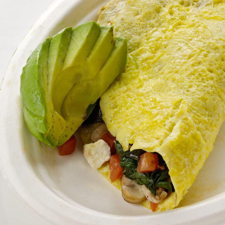 Santa Fe Omelet · 3 cage-free eggs, avocado, cheddar, corn, guajillo black beans, and pico de gallo with grapes on the side. Add meat for an additional charge.