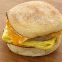 Breakfast Sandwich · Cage-free eggs stacked on an English muffin with sausage and cheddar.