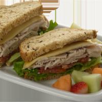Roasted Turkey Sandwich · Swiss with tomatoes, leaf lettuce, and honey mustard.