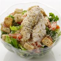 Chicken Caesar Salad · Baked chicken, romaine, Roma tomato, Parmesan, and house-made croutons with Caesar dressing.