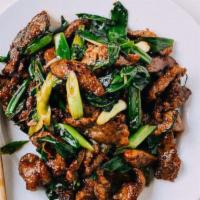 Scallion Beef · Stir fried and sauced beef with scallion, serve w/ rice