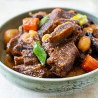 Kalbi Jjim · Braised beef short rib with potato, carrot and rice cake, serve w/ rice