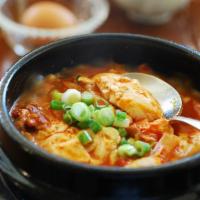 A24. Seafood Tofu Jjigae · Soft tofu with stew, seafood and egg.