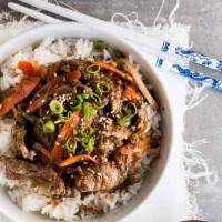 A10. Bulgogi Over Rice · Marinated beef with vegetables over rice