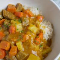 A12. Curry Over Rice · Korean style curry with onion, potato, carrot over rice. Add seafood, Bulgogi, chicken, pork...