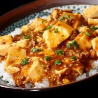 A13. Spicy Tofu Over Rice · Diced tofu, beef and vegetables stir-fried in a spicy sauce over rice.