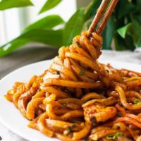 A18. Fried Udon · Fried udon noodles with assorted of vegetables. Add bulgogi, chicken, kimchi, spicy pork for...