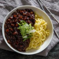 A19. Jajangmyeon · Homemade noodles topped with a rich black bean sauce with pork and vegetables.