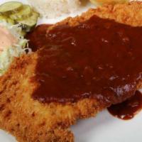 A38. Pork Cutlet · Fried breaded pork cutlet with special sauce.