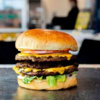 Jumbo Steak Burger · Three 6 oz. juicy steak burger patties and slices of American cheese topped with regular bur...