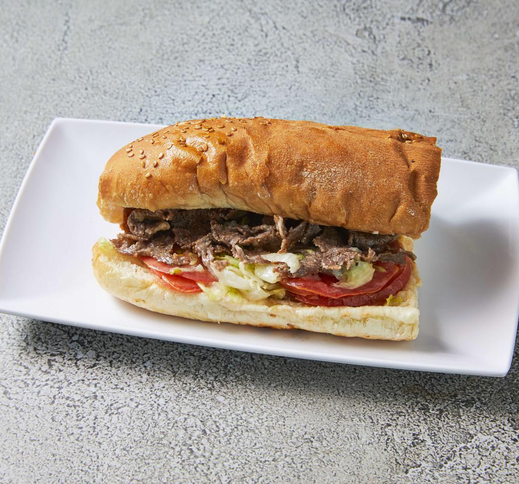 Pizza Steak and Cheese Sub · Steak and cheese with pizza sauce.