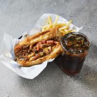Loaded Steak Sub Combo · Pizza sauce, green peppers and mushrooms. Comes with medium fountain drink and fries or chips.