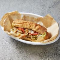 Grilled Chicken Sub · A hearty favorite with all the toppings.