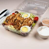 Chicken Souvlaki · Served over Greek salad.