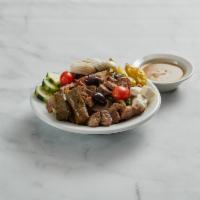 Greek Chef Salad · Choice of gyros meat and pork or chicken souvlaki with lettuce, tomato, cucumber, feta chees...
