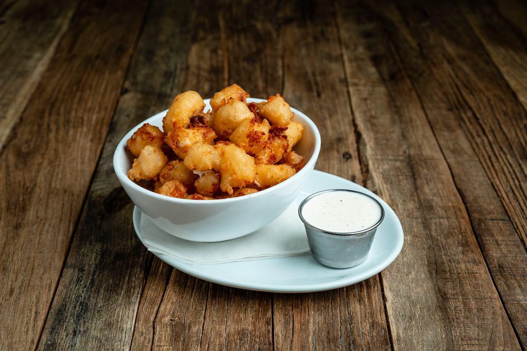 Cheese Curds · Served with white cheddar curds, BBQ, ranch, or Heinz.